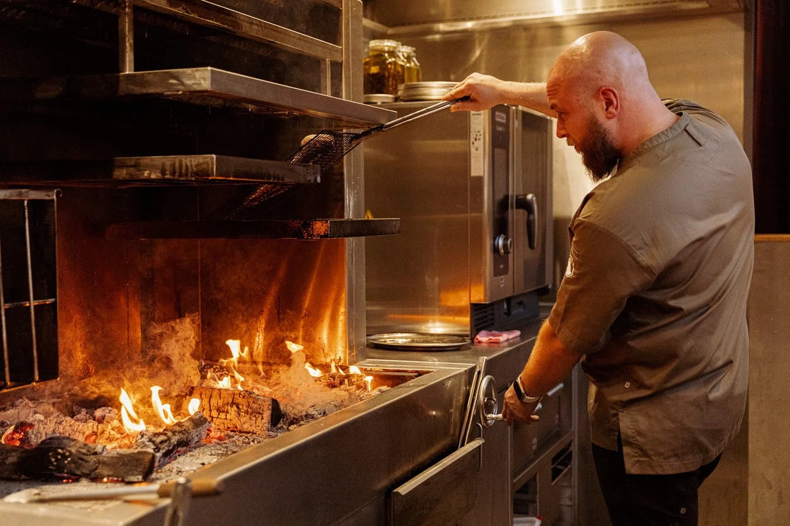 Woodfire Kitchen grill chef